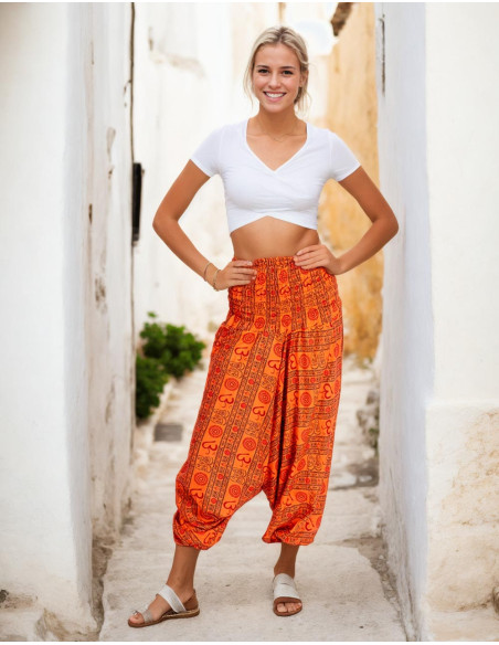 Pantaloni saruel arancioni in stile hippie con simbolo Om in cotone