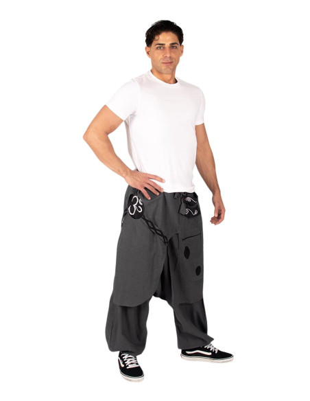 Pantalon afghan en coton gris à ourlet asymétrique et symbole Om